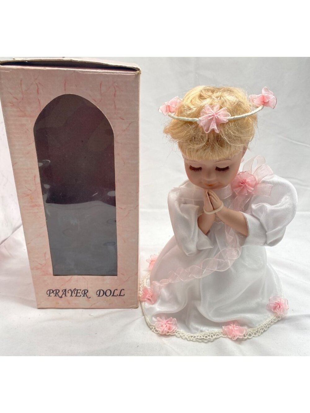 Prayer Doll With Blonde Braided Hair & White Dress Accented With Pink Flowers